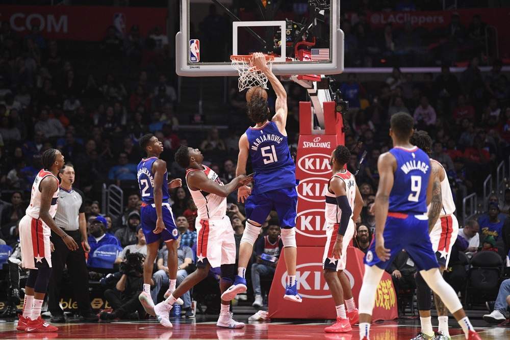 Boban Mania: Marjanovic jumps into NBA with both feet – and lands dunking  on someone - NBC Sports
